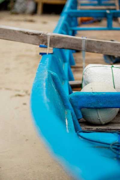 Half blue boat on the beach by Dieuwertje Van der Stoep