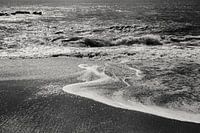 Wenn das Wasser den Strand erreicht