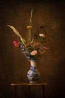 Blumen in antiker Vase