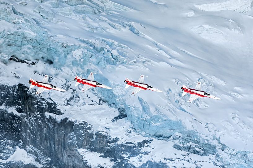 Patrol Suisse passes a glacier on the Eiger massif by Martin Boschhuizen