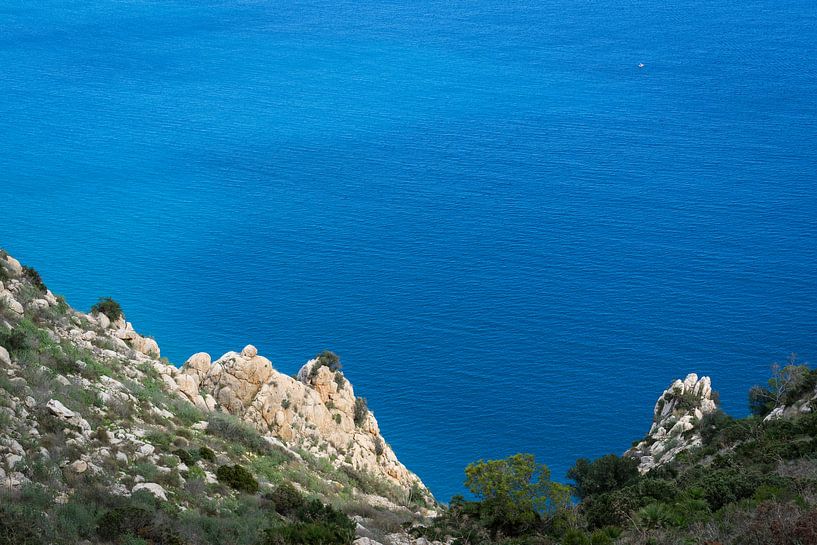 Blue sea water and cliffs in the natural park by Adriana Mueller
