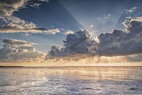 Le soleil derrière les nuages