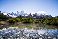 Crystal clear river with view of the Andes