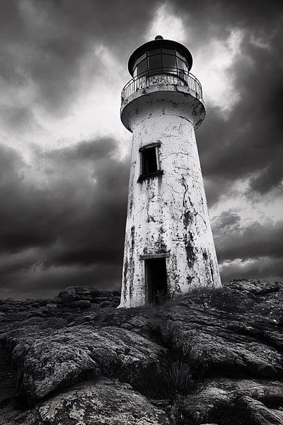 Dramatic lighthouse with storm sky by Imperial Art House