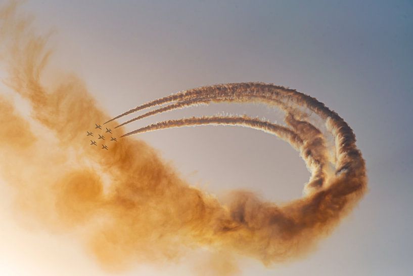 Air show with flying squadron and smoke effect in the sky by Dieter Walther