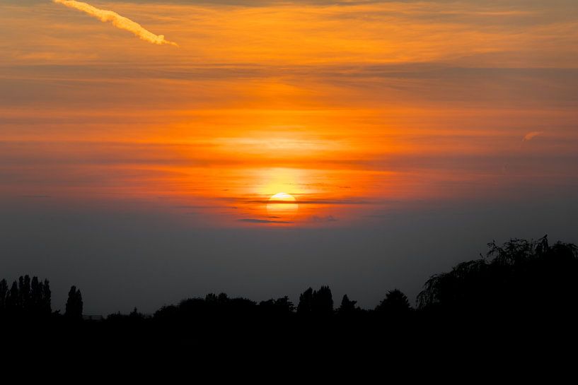 Zonsondergang met prachtige gloed par Ronald Huijzer