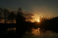 zonsondergang met water