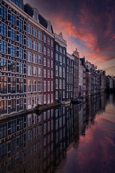 canal houses on the Damrak in Amsterdam, the capital of the Netherlands. by gaps photography