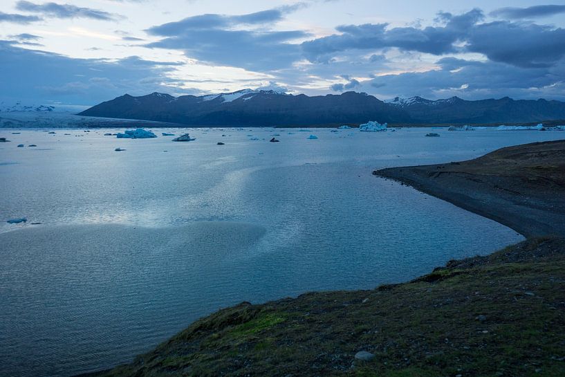 Iceland - Coast of glacier lagoon joekulsarlon and majestic mountains by adventure-photos