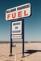 Retro petrol station sign along the road in Australia