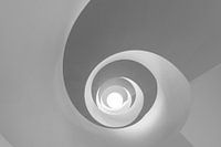 Looking up at a spiral staircase