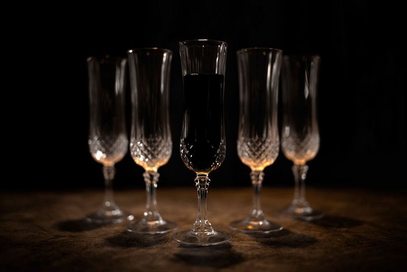 Still life crystal glasses and orange glow by Steven Dijkshoorn