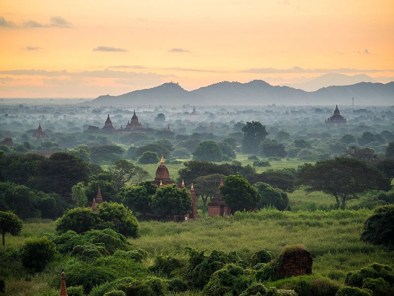 Sunset at temple field in Bagan, Myanmar by Shanti Hesse