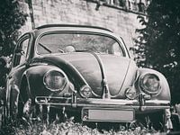 Black and white photograph of a VW beetle