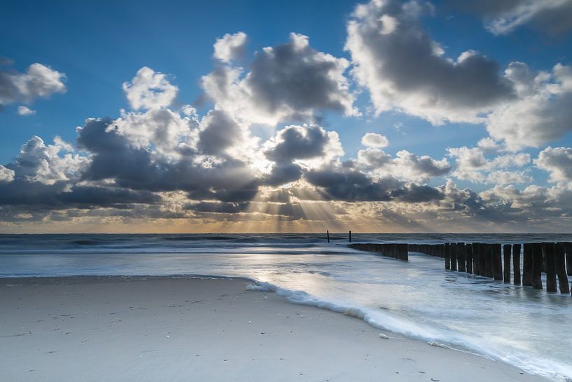 Sun and clouds at the beach of Zoutelande by Bas Verschoor