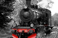 Steam locomotive with driver.