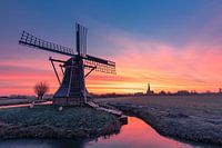 sunrise behind the windmill