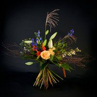 Exuberant bunch of flowers against a dark background