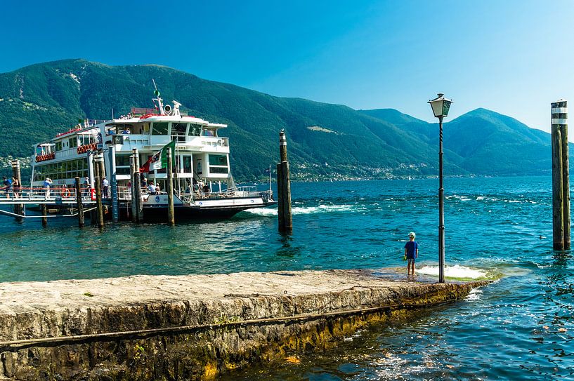 Child on the pier by Tony Buijse