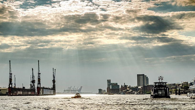 Port of Hamburg with ships and dry dock during cloudy weather by Dieter Walther