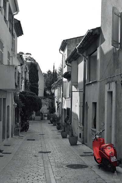 Red scooter in a little street at Saint-Tropez by Tom Vandenhende