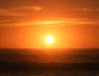 Opgaande zon in Moeraki, Nieuw-Zeeland