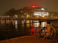 Bicycle in Front of Royal Theater Carre on a Foggy Night