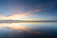 Spiegelung im Watt bei Sonnenuntergang