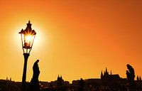 Sunset silhouettes of Charles Bridge in Prague