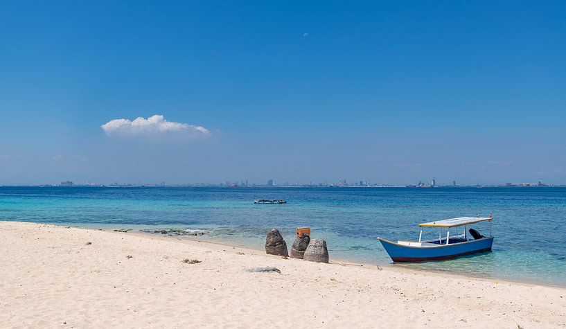Boat at a tropical beach. by Floyd Angenent