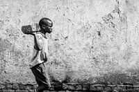 It's hard work to survive in the slums of Uganda