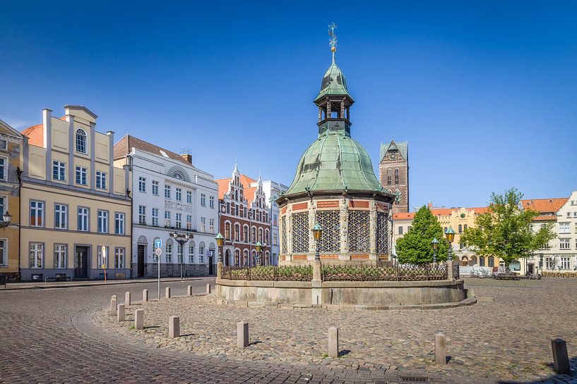 Water art on the market place in the old town of Wismar by Christian Müringer