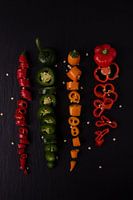 vier gekleurde pepers