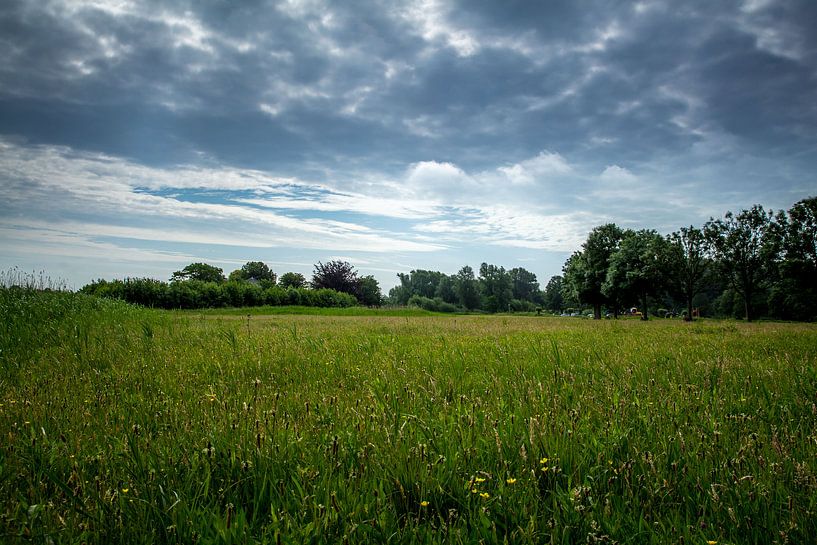 Landscape with cloudy sky by Jaap Mulder