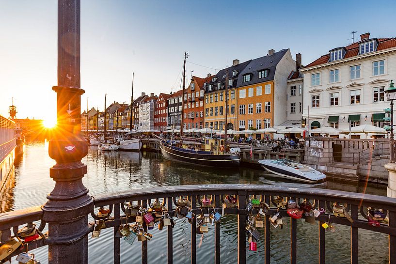 Love locks on a bridge in Nyhavn by Easycopters