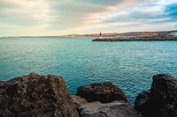 Blue sea with lighthouse