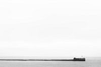 Black and white minimalism of a seaside palisade