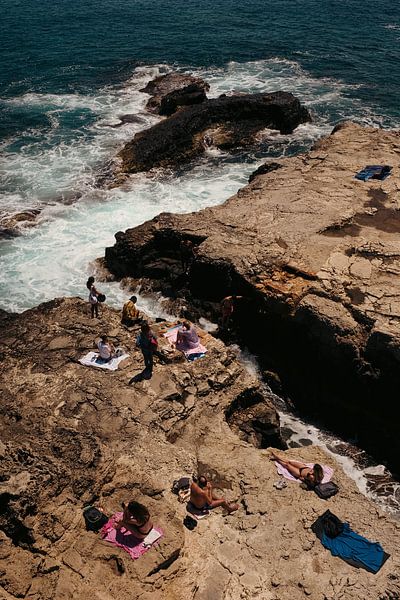 Sunbathing in Ortigia, Sicily by Rosella Fennis