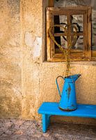 Blue bench in French alley