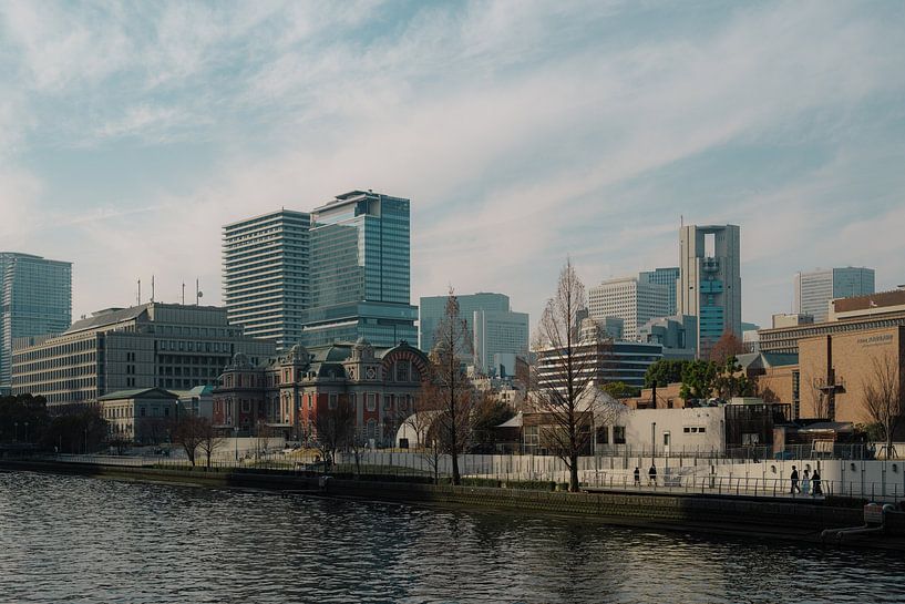 Urban Osaka: Futuristic skyline on the riverbank by NZME Photography