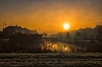 Zonsopkomst in de mist