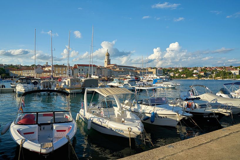 Boats in the port of Krk in Croatia by Heiko Kueverling