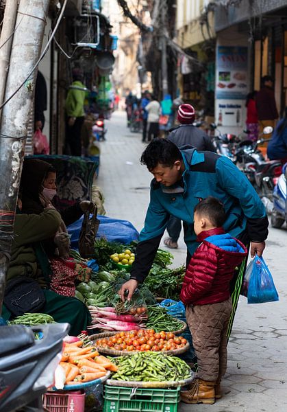 Vegetable sale in a side street of Thamel Kathmandu by Ton Tolboom