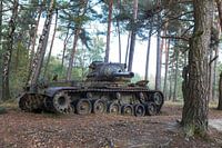 Abandoned military tank in a forest, urban exploring