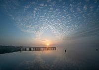 sunrise with reflection on water