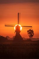 molen met opkomende zon