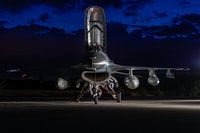 F-16 'Orange Jumper' with open canopy during 'blue hour'