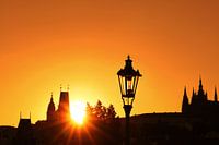 Sunset silhouettes of Charles Bridge in Prague