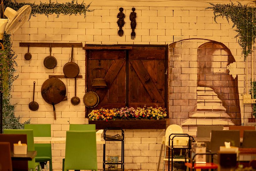 Rustic restaurant wall with painting by Franklin Driessen