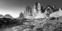 Stream at the foot of the Three Peaks in the Dolomites in black and white.